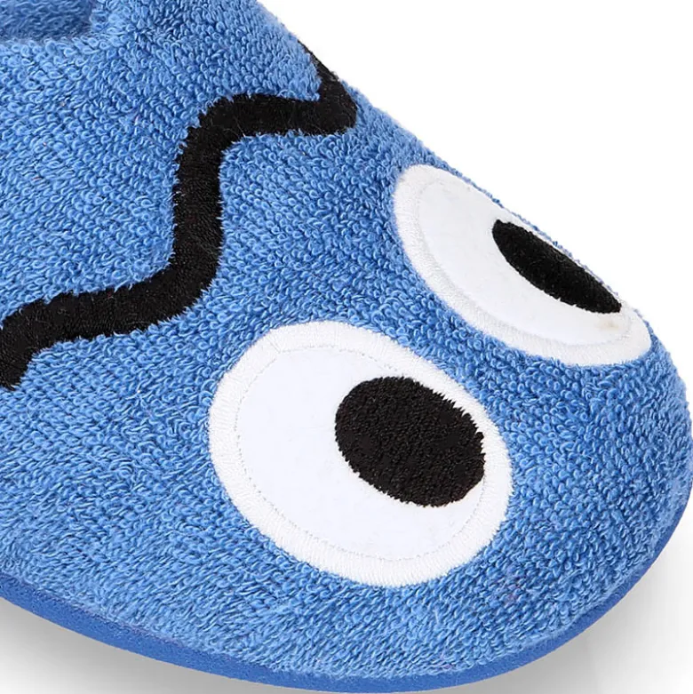 Zapatilla casa niños destalonada en lona toalla con diseño divertido.