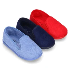 Zapatilla casa niño tipo Kung Fu con elásticos en toalla.