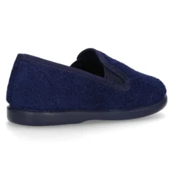 Zapatilla casa niño tipo Kung Fu con elásticos en toalla.