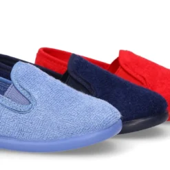 Zapatilla casa niño tipo Kung Fu con elásticos en toalla.