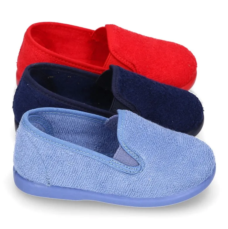Zapatilla casa niño tipo Kung Fu con elásticos en toalla.