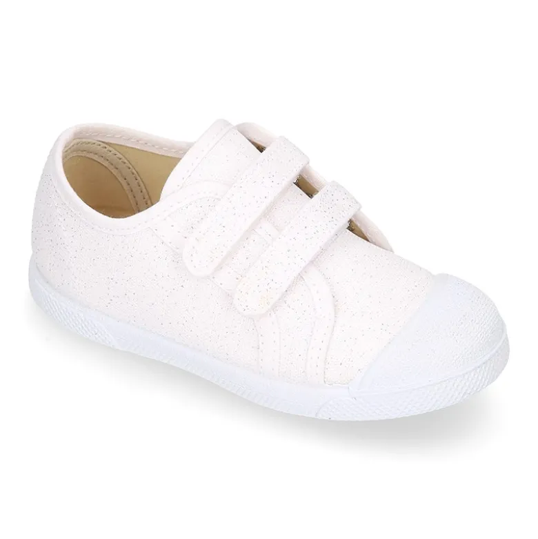 Zapatilla niña con puntera y sin cordones en lona METALIZADA.