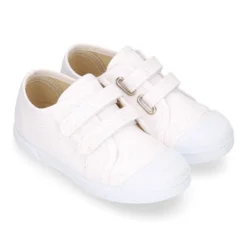 Zapatilla niña con puntera y sin cordones en lona METALIZADA.