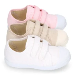 Zapatilla niña con puntera y sin cordones en lona METALIZADA.