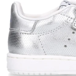 Zapatilla niña moda sin cordones en piel metalizada.