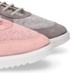 Zapatilla niña tipo tenis con cordones en lona punto con piel serraje.