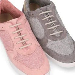 Zapatilla niña tipo tenis con cordones en lona punto con piel serraje.