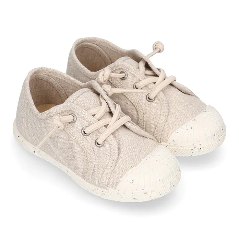 Zapatilla niño con puntera y cordones elásticos en lona algodón RECICLADO en colores suaves.