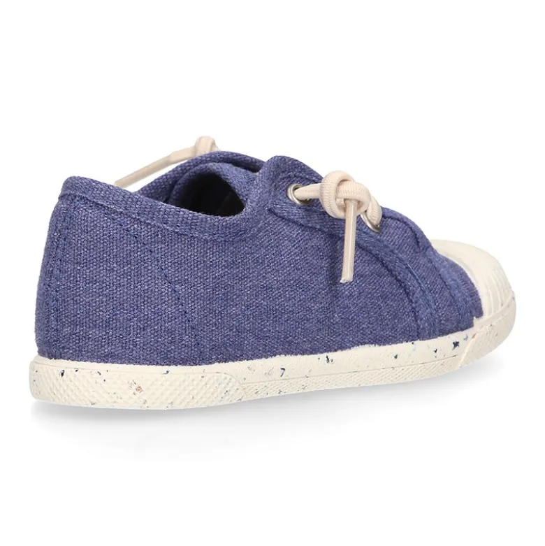 Zapatilla niño con puntera y cordones elásticos en lona algodón RECICLADO en colores suaves.