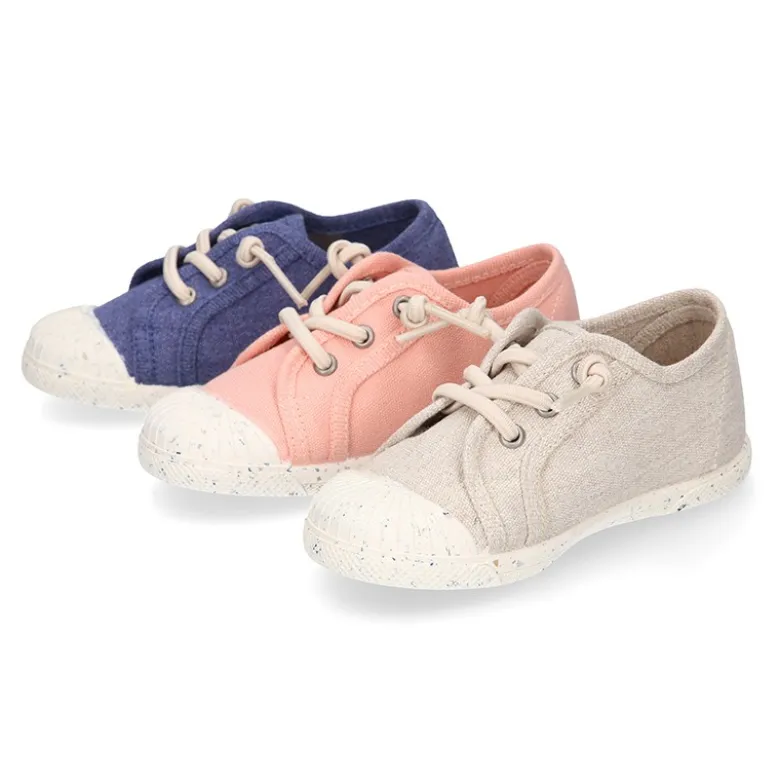 Zapatilla niño con puntera y cordones elásticos en lona algodón RECICLADO en colores suaves.