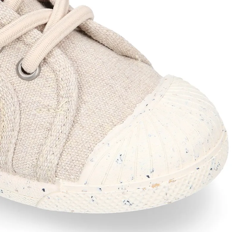 Zapatilla niño con puntera y cordones elásticos en lona algodón RECICLADO en colores suaves.