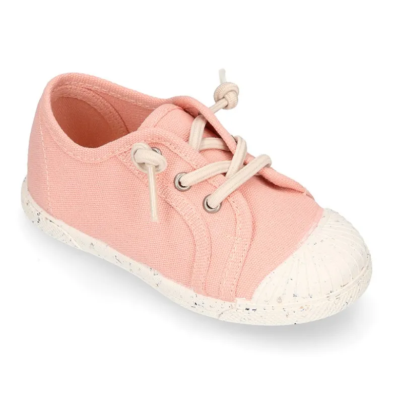 Zapatilla niño con puntera y cordones elásticos en lona algodón RECICLADO en colores suaves.