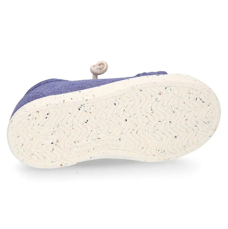 Zapatilla niño con puntera y cordones elásticos en lona algodón RECICLADO en colores suaves.
