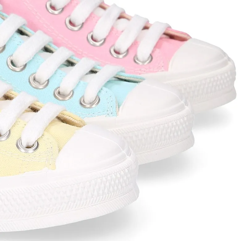 Zapatilla niños CASUAL con puntera y cordones en colores pasteles.