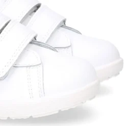 Zapatilla niños colegial OKAA sin cordones, rayas laterales y puntera reforzada en piel lavable.