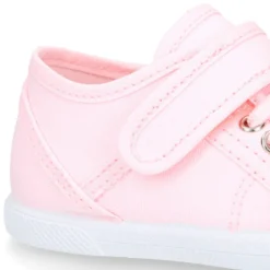 Zapatilla niños con puntera y cordones elásticos en lona en colores pastel.