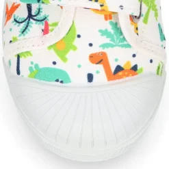 Zapatilla niño sin cordones en lona algodón estampado DINOS y puntera.