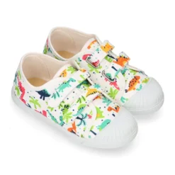 Zapatilla niño sin cordones en lona algodón estampado DINOS y puntera.