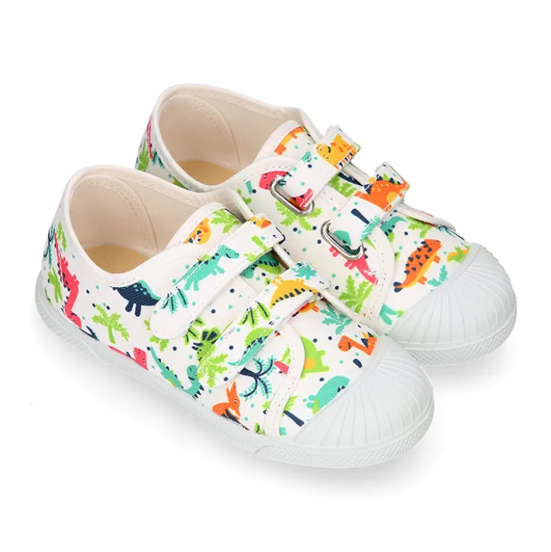 Zapatilla niño sin cordones en lona algodón estampado DINOS y puntera.