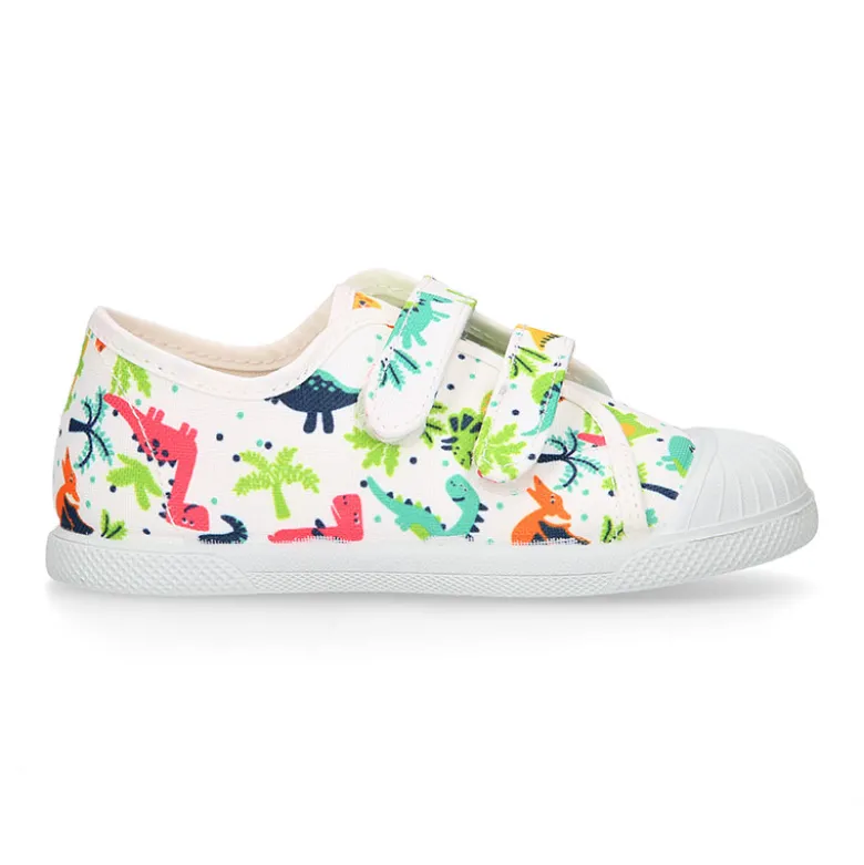 Zapatilla niño sin cordones en lona algodón estampado DINOS y puntera.