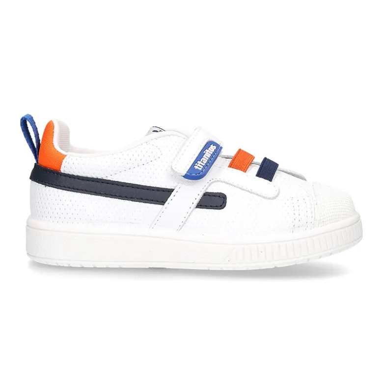 Zapatilla niño sin cordones y con ELÁSTICOS en piel lavable.