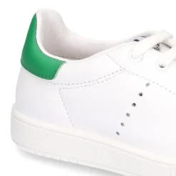 Zapatilla niños Moda con cordones en piel.