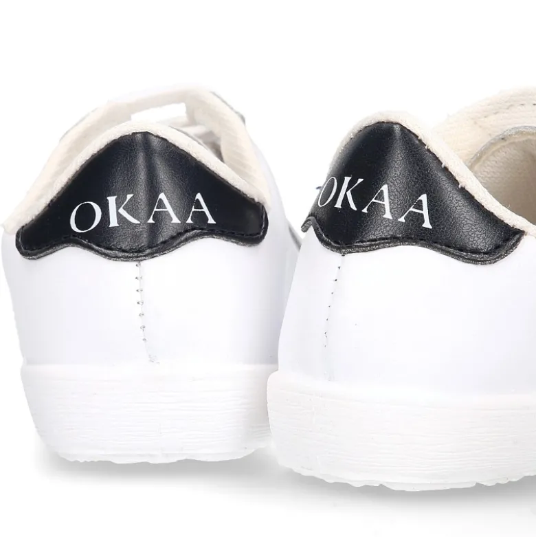 Zapatilla niños OKAA con cordones y puntera en piel lavable.