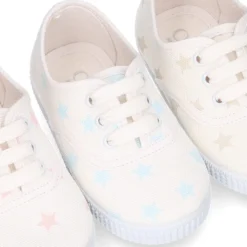 Zapatilla niños tipo Bamba con cordones en lona con estrellas pasteles.