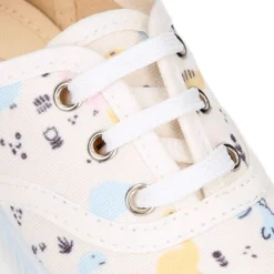 Zapatilla niños tipo Bamba con cordones en lona con DINOSAURIOS.