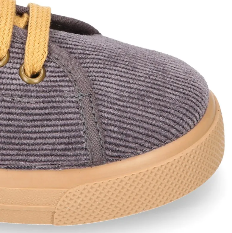 Zapatilla niños vestir OKAA en Pana con cordones.