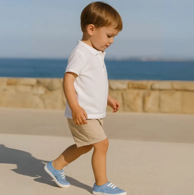 Zapatilla niño tipo Bamba con cordones en lona con BARCOS.