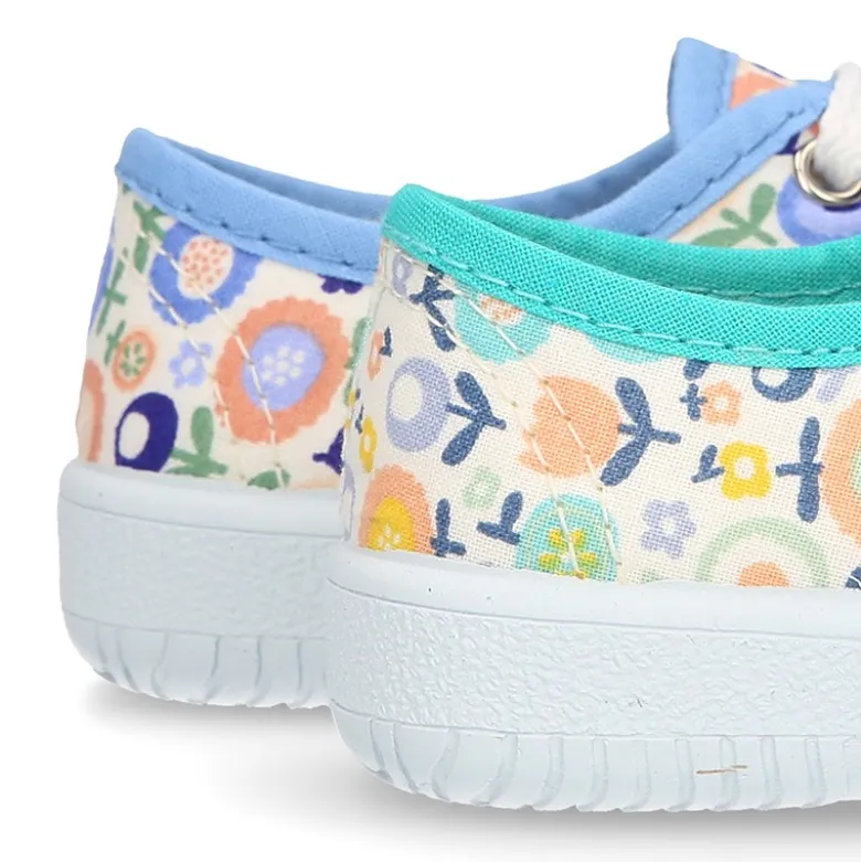 Zapatilla o bamba en lona con dibujos de flores para niños y niñas.