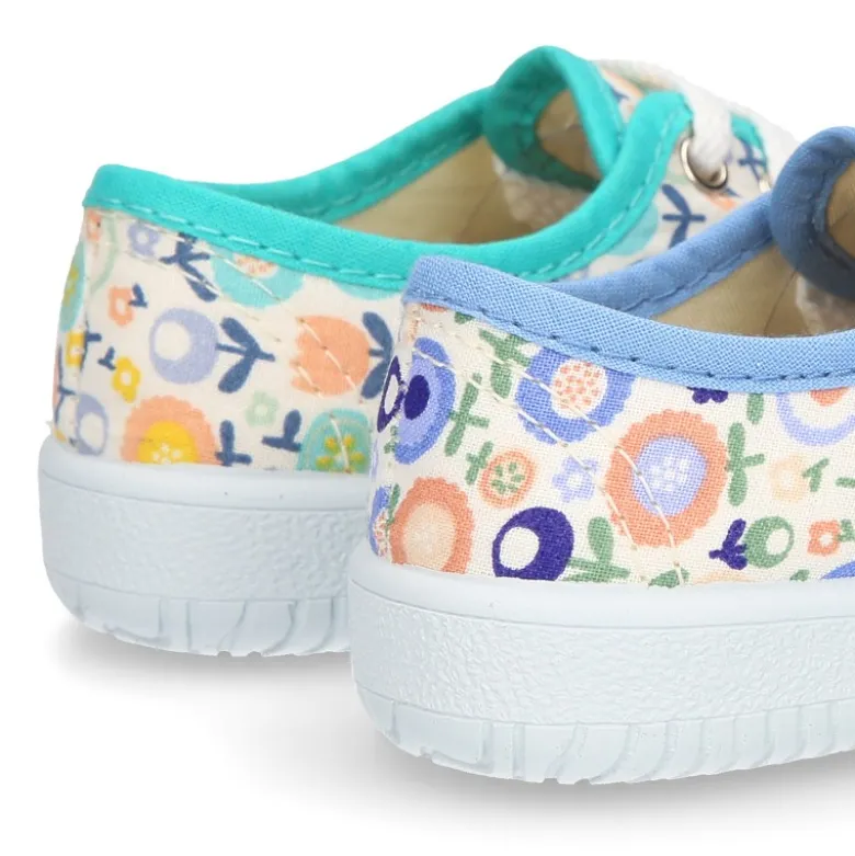 Zapatilla o bamba en lona con dibujos de flores para niños y niñas.