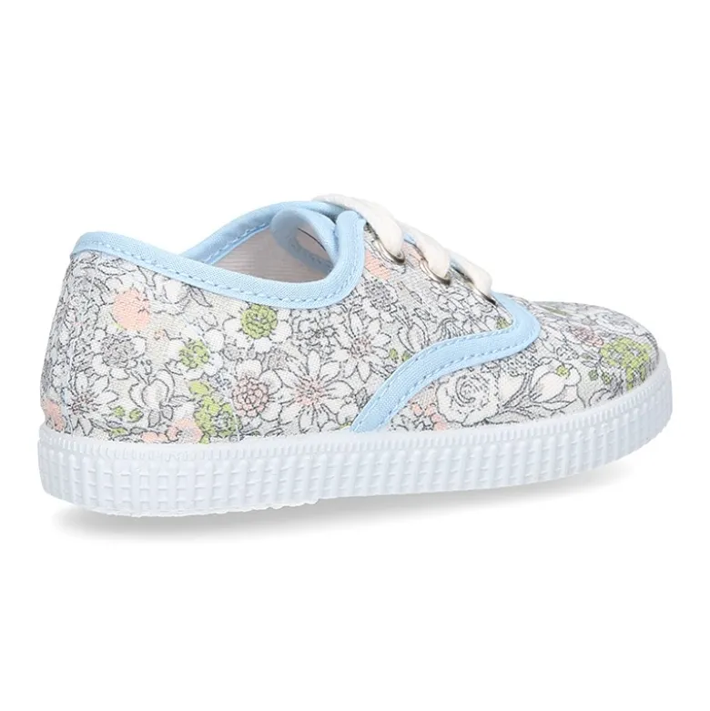 Zapatilla tipo Bamba con cordones en lona algodón con FLORES pasteles.