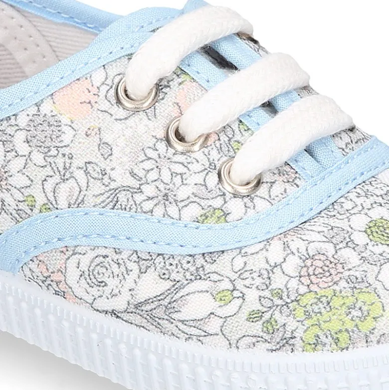 Zapatilla tipo Bamba con cordones en lona algodón con FLORES pasteles.