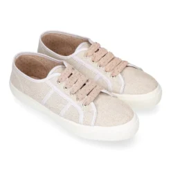 Zapatilla tipo bamba con cordones en lona lino metalizado.