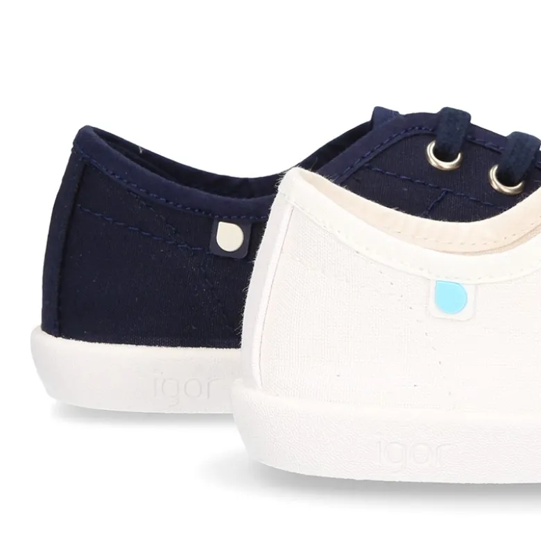 Zapatilla tipo bamba con cordones y puntera.