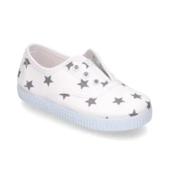 Zapatilla tipo bamba con elástico en lona con estrellas.