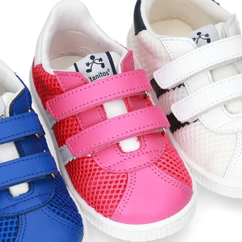 Zapatilla VERANO sin cordones y con rayas laterales en piel lavable combinada con lona rejilla.