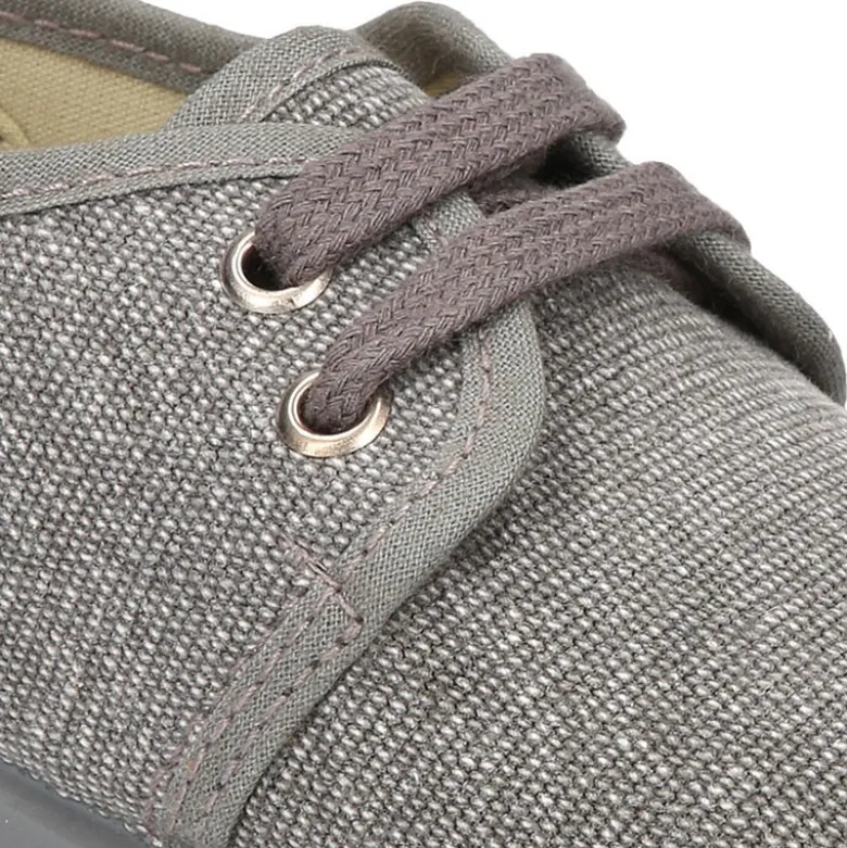 Zapatito tipo Blucher con cordones en lona efecto lavado.