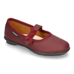Zapato colegial tipo Mercedita con cierre adherente con lazo en piel lavable para niñas.
