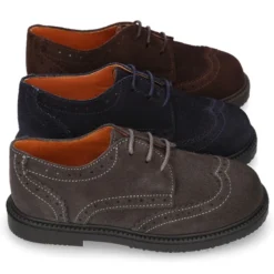 Zapato vestir Niño tipo Blucher con cordones y picados en piel Serraje.