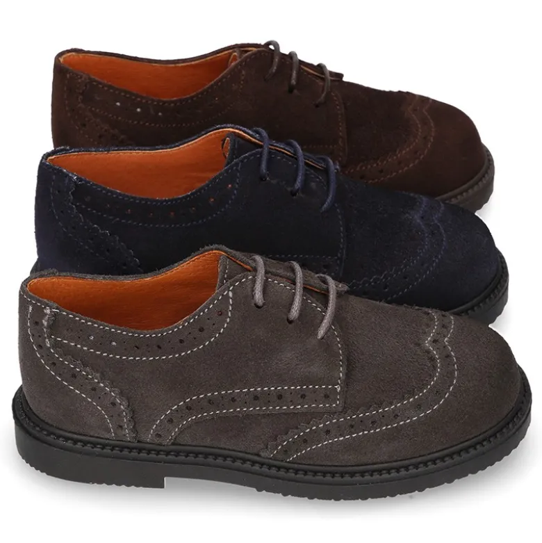 Zapato vestir Niño tipo Blucher con cordones y picados en piel Serraje.