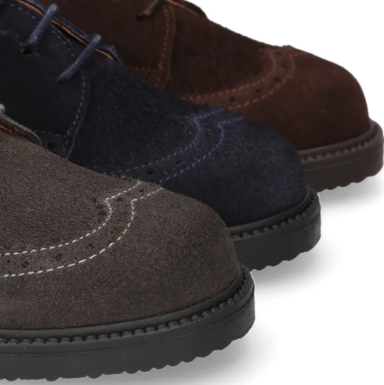Zapato vestir Niño tipo Blucher con cordones y picados en piel Serraje.