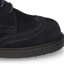 Zapato vestir Niño tipo Blucher con cordones y picados en piel Serraje.