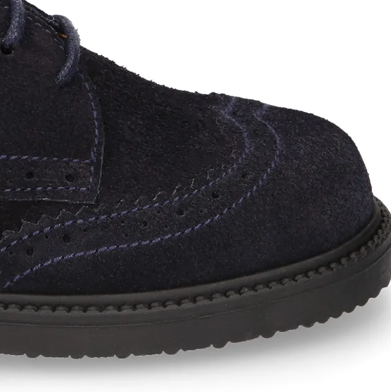 Zapato vestir Niño tipo Blucher con cordones y picados en piel Serraje.
