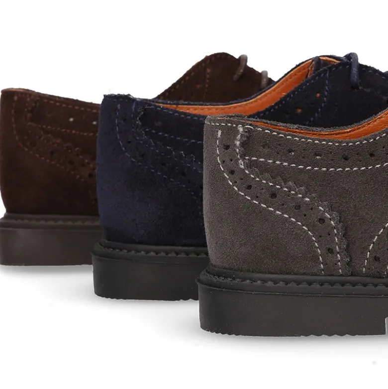 Zapato vestir Niño tipo Blucher con cordones y picados en piel Serraje.